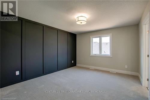 100 Aspen Circle, Thames Centre, ON - Indoor Photo Showing Other Room
