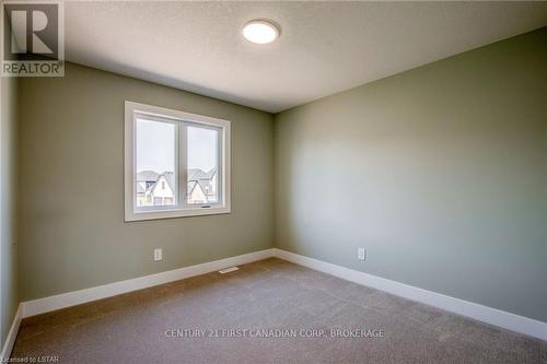 100 Aspen Circle, Thames Centre, ON - Indoor Photo Showing Other Room