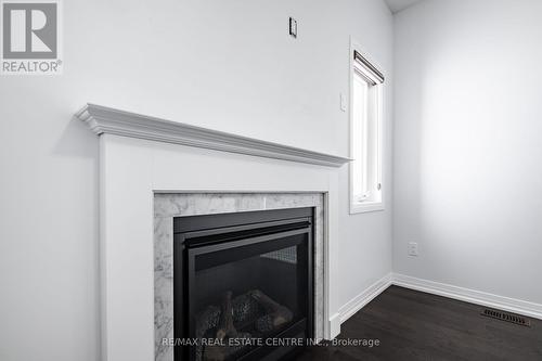 45 Rainey Drive, East Luther Grand Valley, ON - Indoor Photo Showing Living Room With Fireplace