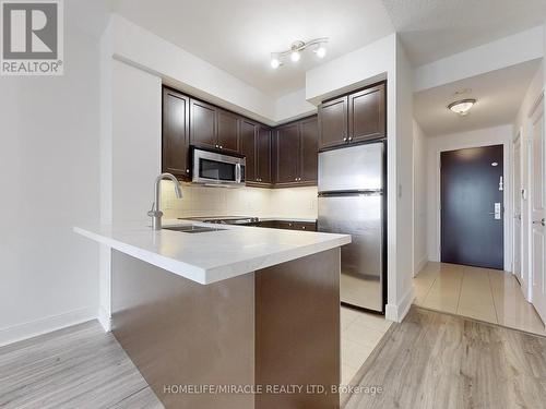 306 - 50 Absolute Avenue, Mississauga, ON - Indoor Photo Showing Kitchen With Stainless Steel Kitchen With Upgraded Kitchen