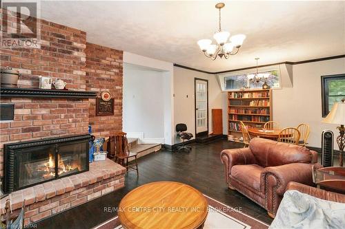 30622 Hungry Hollow Road, North Middlesex, ON - Indoor Photo Showing Living Room With Fireplace