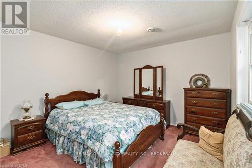 30622 Hungry Hollow Road, North Middlesex, ON - Indoor Photo Showing Bedroom