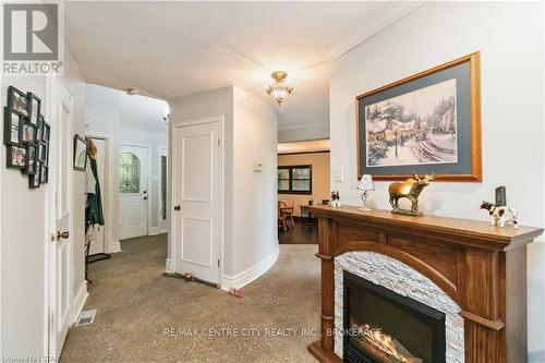 30622 Hungry Hollow Road, North Middlesex, ON - Indoor With Fireplace