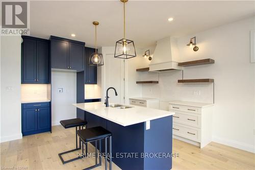 147 Mcleod Street, North Middlesex, ON - Indoor Photo Showing Kitchen With Double Sink