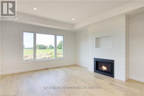 147 Mcleod Street, North Middlesex, ON - Indoor Photo Showing Living Room With Fireplace