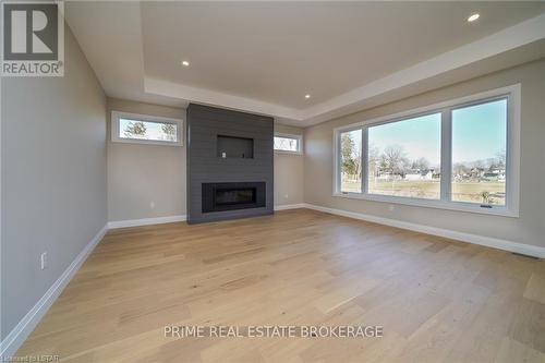 9 Spruce Crescent, North Middlesex, ON - Indoor With Fireplace