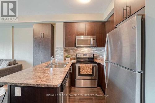 305 - 55 Yorkland Boulevard, Brampton, ON - Indoor Photo Showing Kitchen With Double Sink With Upgraded Kitchen