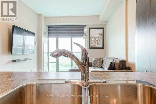 305 - 55 Yorkland Boulevard, Brampton, ON - Indoor Photo Showing Kitchen With Double Sink