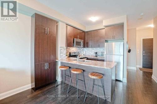 305 - 55 Yorkland Boulevard, Brampton, ON - Indoor Photo Showing Kitchen With Upgraded Kitchen