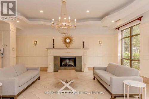 2106 A - 710 Humberwood Boulevard, Toronto, ON - Indoor Photo Showing Living Room With Fireplace
