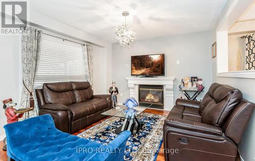 42 Applegrove Court, Brampton, ON - Indoor Photo Showing Living Room With Fireplace