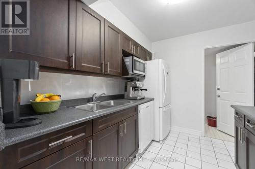 301 - 3233 Eglinton Avenue E, Toronto, ON - Indoor Photo Showing Kitchen With Double Sink