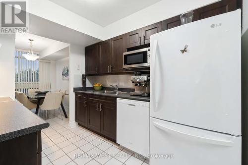 301 - 3233 Eglinton Avenue E, Toronto, ON - Indoor Photo Showing Kitchen With Double Sink