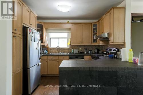 107 Elmhurst Avenue, Toronto, ON - Indoor Photo Showing Kitchen With Double Sink