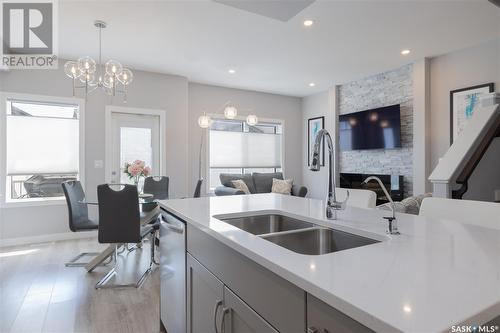 228 Brighton Gate, Saskatoon, SK - Indoor Photo Showing Kitchen With Double Sink