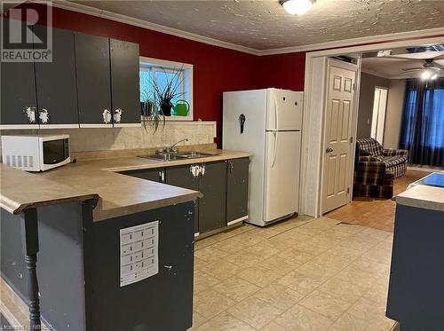 57 Riverside Avenue, South River, ON - Indoor Photo Showing Kitchen With Double Sink