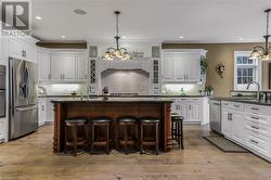 Gourmet kitchen with built-in appliances and 2 dishwashers - 