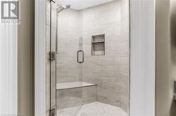 Recently updated tile and glass primary shower - 