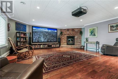 Wood burning fireplace. A true entertainment room! - 1 Mccannel Lane, Saugeen Shores, ON - Indoor Photo Showing Living Room With Fireplace