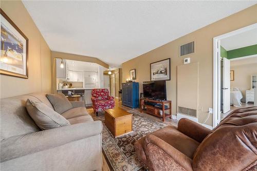 Filled with natural light - 1270 Maple Crossing Boulevard|Unit #204, Burlington, ON - Indoor Photo Showing Living Room