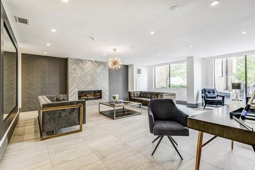 Beautifully updated, modern lobby - 1270 Maple Crossing Boulevard|Unit #204, Burlington, ON - Indoor With Fireplace