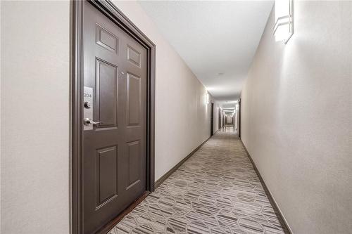 Unit 204, located on the second floor - 1270 Maple Crossing Boulevard|Unit #204, Burlington, ON - Indoor Photo Showing Other Room