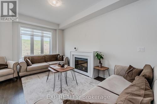 20 Grassbourne Avenue, Kitchener, ON - Indoor Photo Showing Living Room With Fireplace