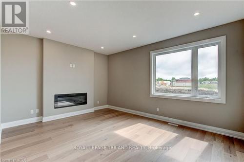 6489 Royal Magnolia Avenue, London, ON - Indoor With Fireplace