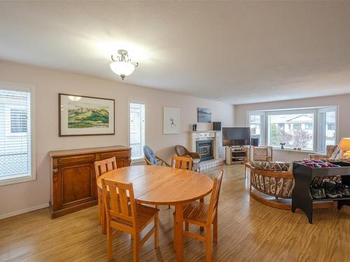 2880 Paris Street, Penticton, BC - Indoor Photo Showing Dining Room With Fireplace