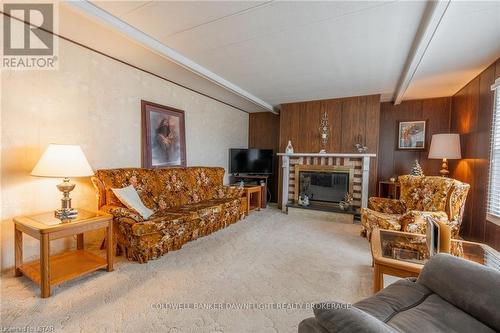 279 Pebble Beach Parkway, Lambton Shores, ON - Indoor Photo Showing Living Room With Fireplace