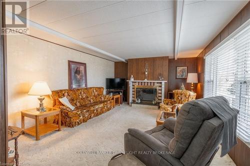 279 Pebble Beach Parkway, Lambton Shores, ON - Indoor Photo Showing Living Room With Fireplace