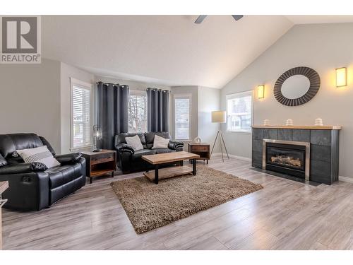 107 1299 N Ospika Boulevard, Prince George, BC - Indoor Photo Showing Living Room With Fireplace