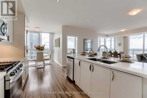 2302 - 55 Eglinton Avenue W, Mississauga, ON - Indoor Photo Showing Kitchen With Double Sink With Upgraded Kitchen