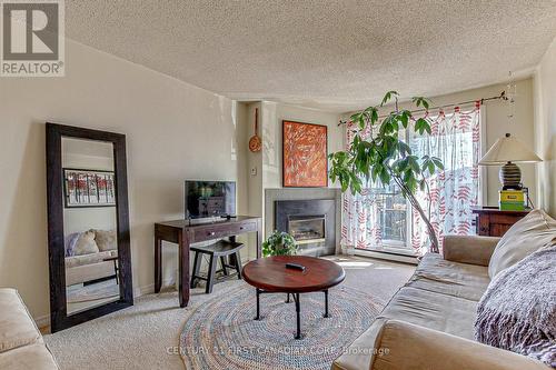 45 - 1096 Jalna Boulevard, London, ON - Indoor Photo Showing Living Room With Fireplace