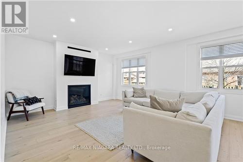 4 Heather Lane, St. Catharines, ON - Indoor Photo Showing Living Room With Fireplace