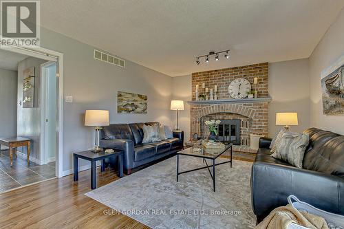 39 Sweetbriar Road, London, ON - Indoor Photo Showing Living Room With Fireplace