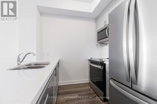 336 - 10 Mallard Trail, Hamilton, ON - Indoor Photo Showing Kitchen With Double Sink