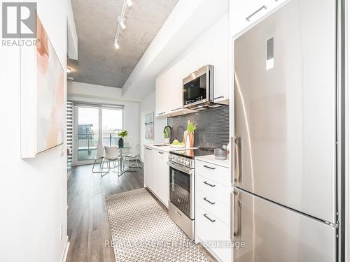 419 - 1808 St Clair Avenue W, Toronto, ON - Indoor Photo Showing Kitchen With Stainless Steel Kitchen