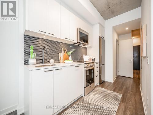 419 - 1808 St Clair Avenue W, Toronto, ON - Indoor Photo Showing Kitchen With Upgraded Kitchen