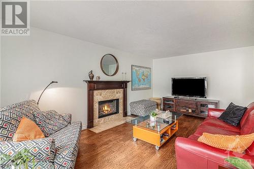 1814 Thistleleaf Crescent, Ottawa, ON - Indoor Photo Showing Living Room With Fireplace