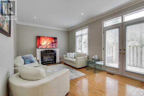 3 Tyre Avenue, Toronto, ON - Indoor Photo Showing Living Room With Fireplace