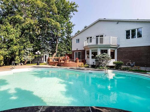 Backyard - 97 Rue Chatillon, Dollard-Des-Ormeaux, QC - Outdoor With In Ground Pool With Balcony With Backyard