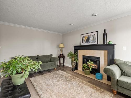 4455 Abraham Crt, Saanich, BC - Indoor Photo Showing Living Room With Fireplace