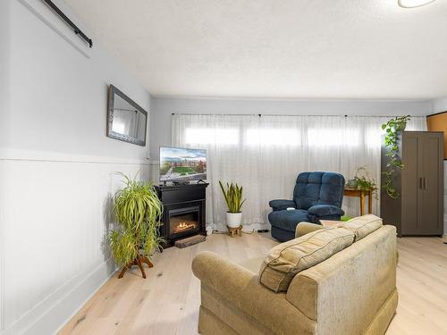 4455 Abraham Crt, Saanich, BC - Indoor Photo Showing Living Room With Fireplace