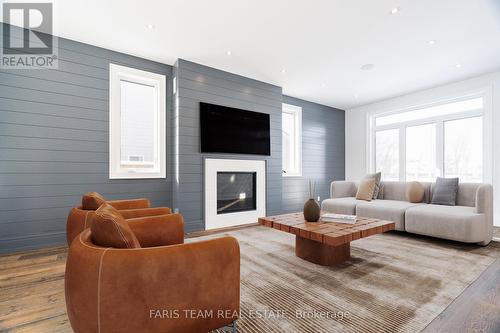 124 Farm Gate Road, Blue Mountains, ON - Indoor Photo Showing Living Room With Fireplace