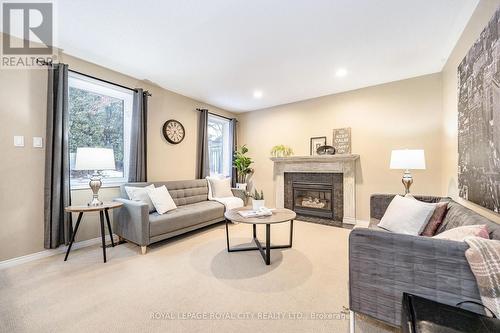 42 Peartree Crescent, Guelph, ON - Indoor Photo Showing Living Room With Fireplace