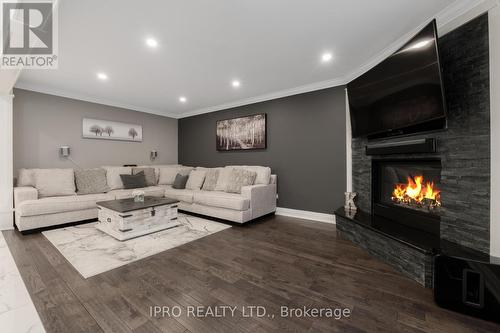 27 Petworth Road, Brampton, ON - Indoor Photo Showing Living Room With Fireplace
