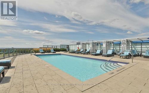 219 - 11 Bronte Road, Oakville, ON - Outdoor With In Ground Pool With View