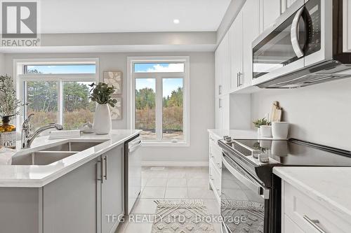 46 Broome Avenue, Clarington, ON - Indoor Photo Showing Kitchen With Double Sink