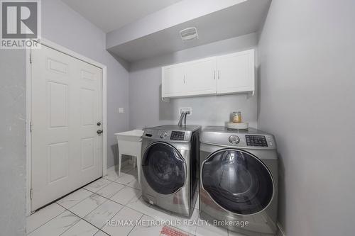 23 Atkinson Crescent, New Tecumseth, ON - Indoor Photo Showing Laundry Room